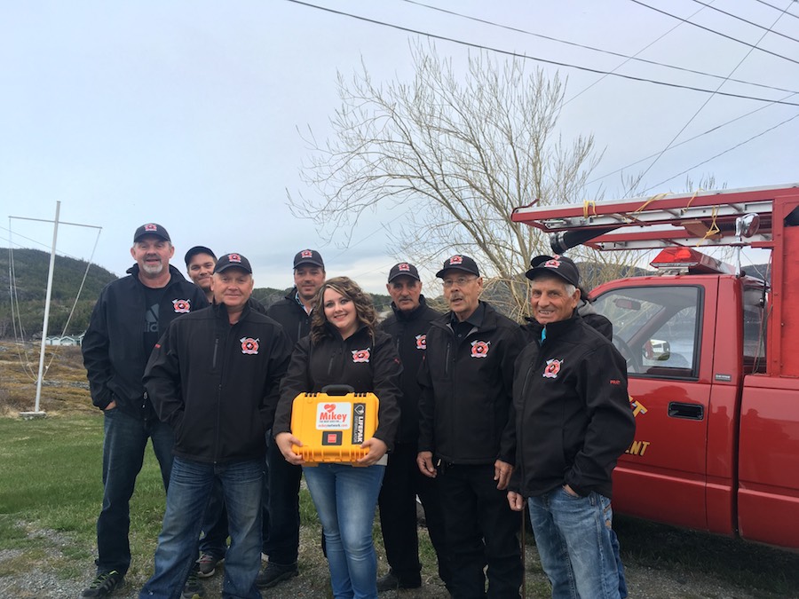 Volunteer fire fighters with their new MIKEY DEFIBRILLATOR in Paquet, Newfoundland and Labrador